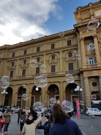 Group of people in front of building
