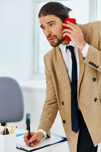 Young man using mobile phone