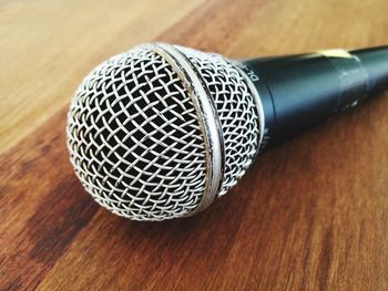 Close-up of microphone on table