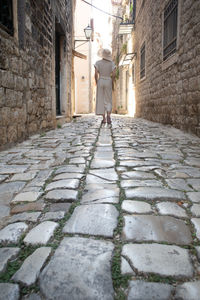 Footpath amidst old building