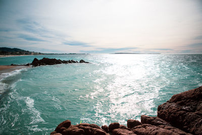Scenic view of sea against sky during sunset