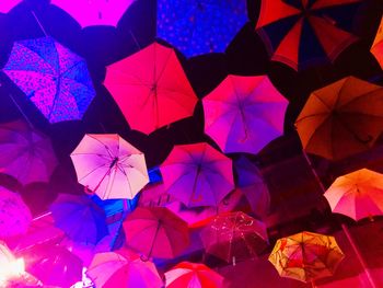 Low angle view of multi colored umbrellas