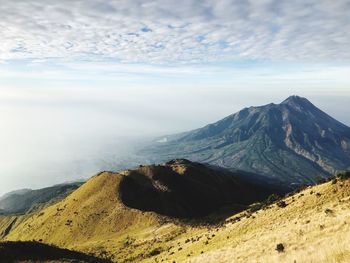 Scenic view of mountain range against sky