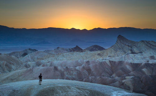 Scenic view of mountains against sky during sunset