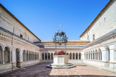 View of historical building against clear blue sky