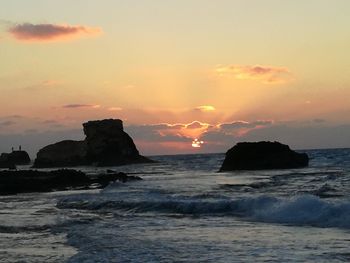 Scenic view of sea against sky during sunset
