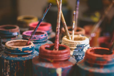 Close up of fresh and colorful brushes in handicraft workshop in ayacucho, peru