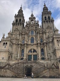 Facade of historic building against sky