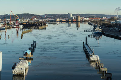 Boats moored at harbor