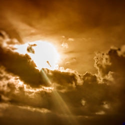 Low angle view of cloudy sky at sunset