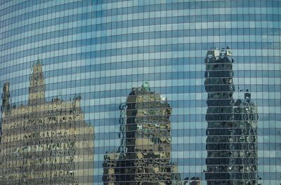 Low angle view of skyscrapers against sky