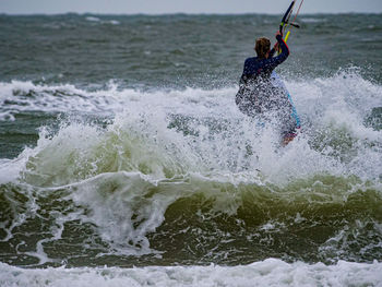 Man surfing in sea