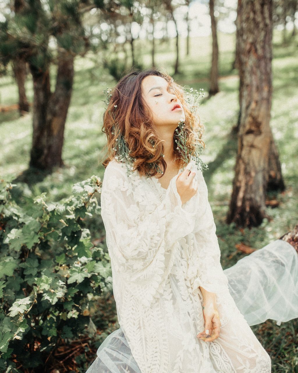 YOUNG WOMAN WITH WHITE EYES CLOSED