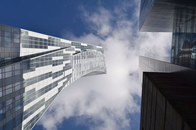 Low angle view of modern buildings against sky