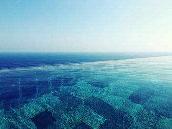 Aerial view of swimming pool against clear sky