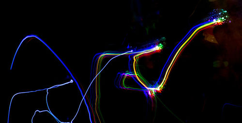 Light painting against black background