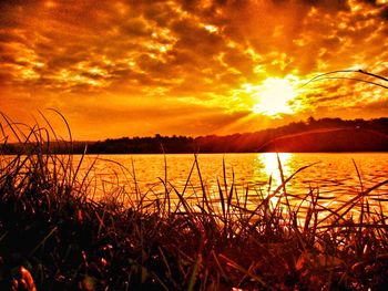 Scenic view of sunset over lake