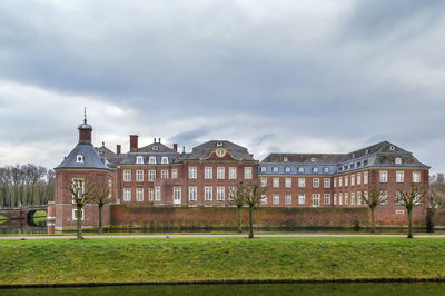 Building against cloudy sky