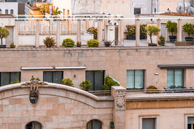 Exterior view of old architecture in central part of barcelona, spain. houses with terraces, decks