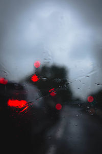 Wet glass window in rainy season