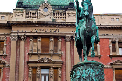 Low angle view of statue outside building