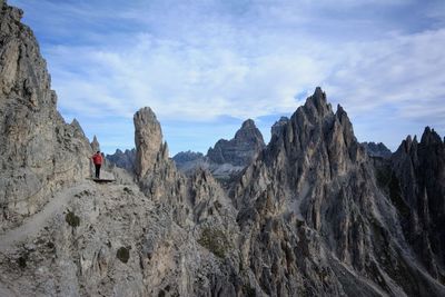 Scenic view of rocks in mountains against sky