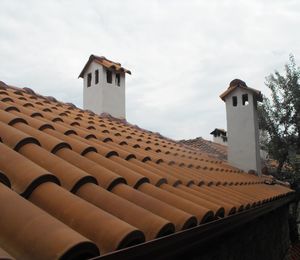 Low angle view of roof of building against sky