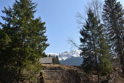 Built structure on mountain against clear sky