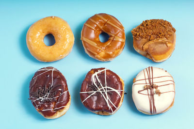 Close-up of donuts on white background