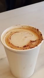 High angle view of cappuccino on table