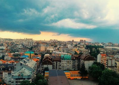 High angle view of buildings against sky at sunset