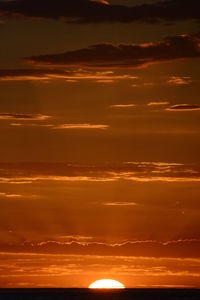 Low angle view of dramatic sky during sunset