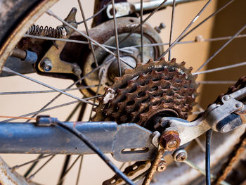 Close-up of rusty damaged bicycle wheel