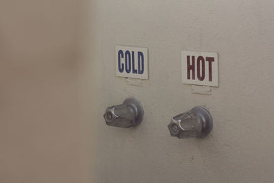 Close-up of mailbox on wall