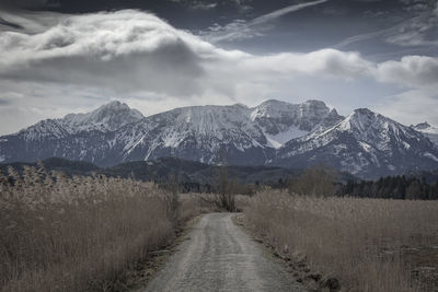 Scenic view of mountains against sky during winter