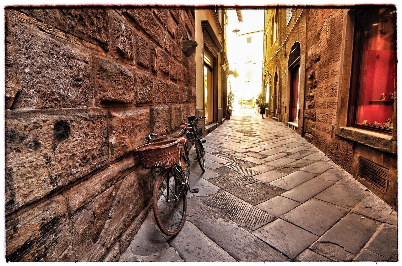 NARROW ALLEY AMIDST BUILDINGS