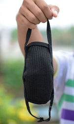 Close-up of woman holding hands