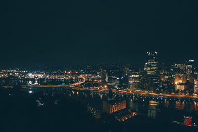 Illuminated city at night