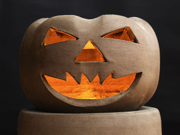 Close-up of pumpkin against black background