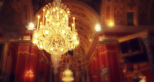 Low angle view of illuminated chandelier