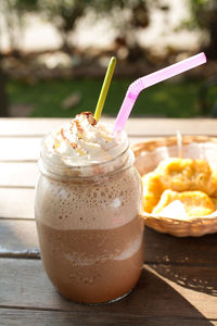 Close-up of smoothie in mason jar on table