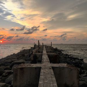 Scenic view of sea against sky during sunset