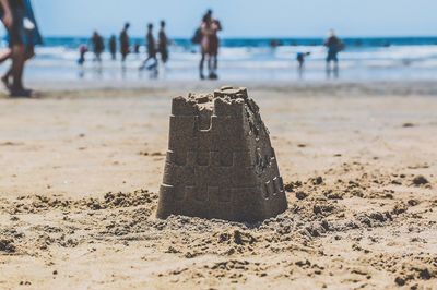 Close-up of people on beach