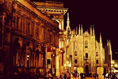 Low angle view of illuminated building at night