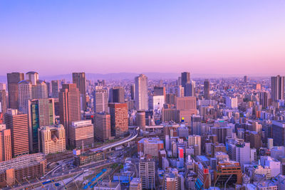 High angle view of buildings against sky during sunset