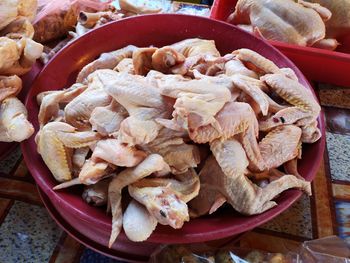 High angle view of meat in container on table