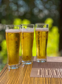 Close-up of beer glass on table