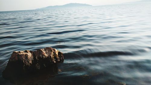 Scenic view of sea against mountain