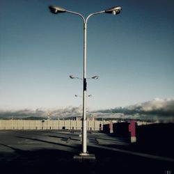 Street light against sky