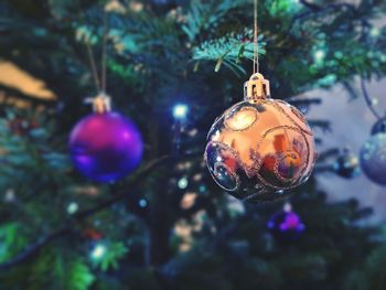 Close-up of christmas decoration hanging on tree